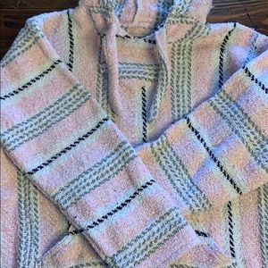 Pink and grey woven poncho